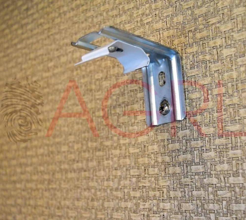 Using a pencil, mark the holes on each bracket for mounting the nails.