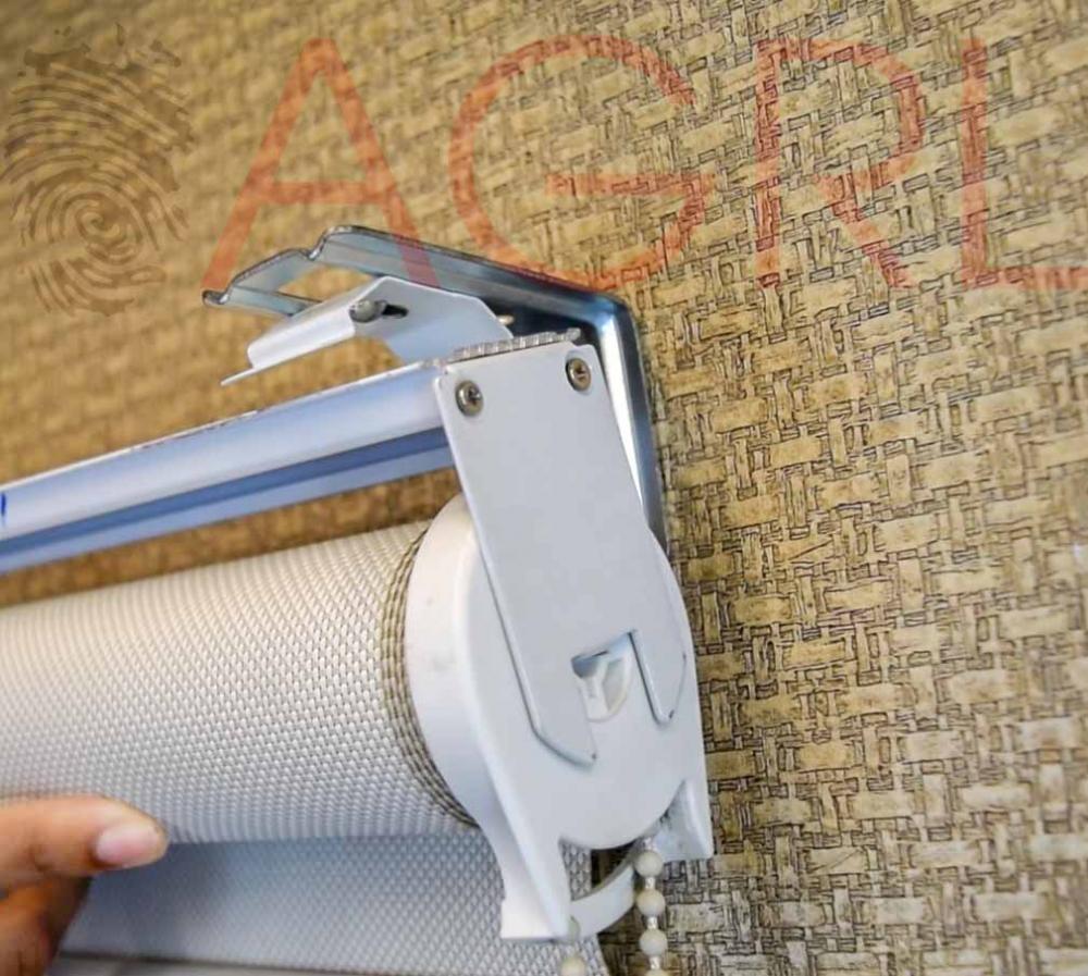 Using a pencil, mark the holes on each bracket for mounting the nails.