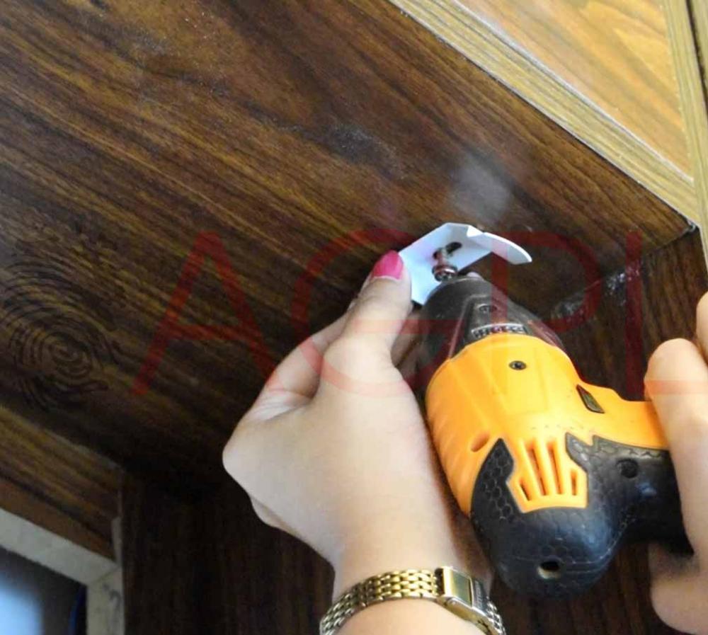 Using a pencil, mark the holes on each bracket for mounting the nails.