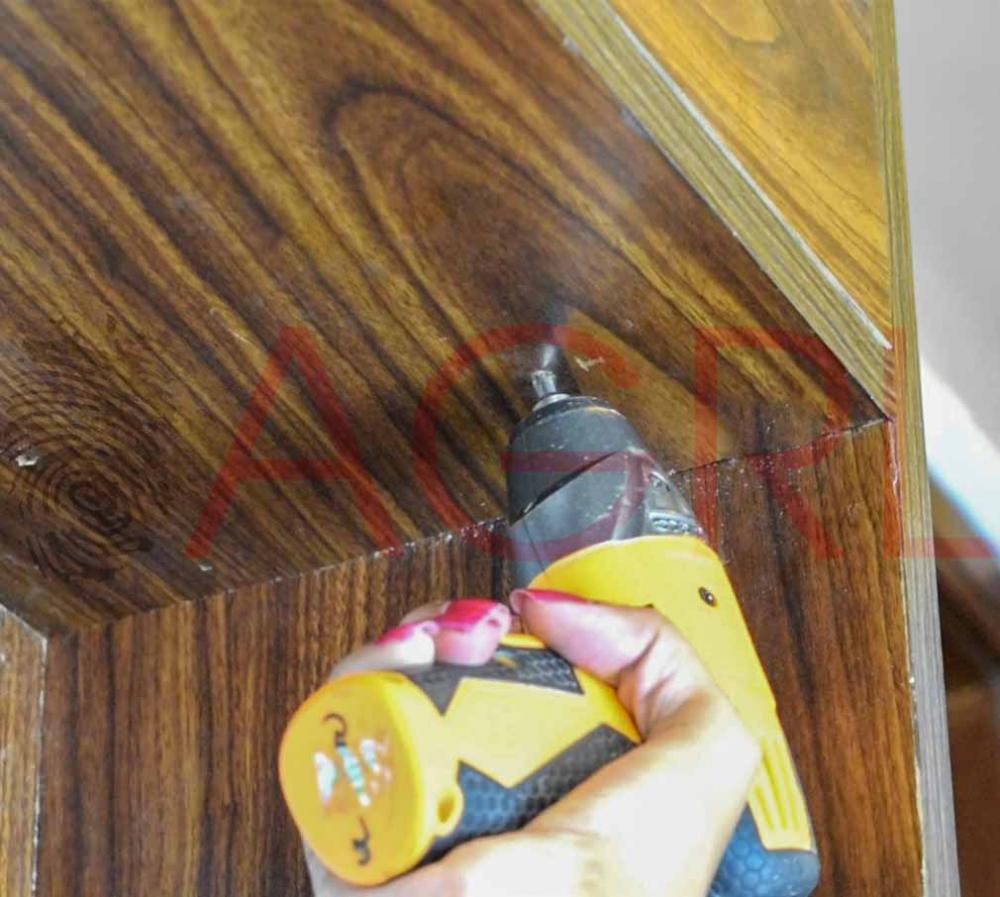 Using a pencil, mark the holes on each bracket for mounting the nails.